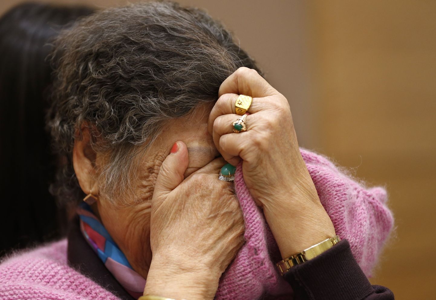 Kang Il-chul, a South Korean woman abused by Japan's wartime military-run brothel system, cries during a press conference in Tokyo, Tuesday, Jan. 26, 2016. Two elderly South Korean women, Kang and Lee Ok-sun, are in Japan to reject a recent settlement agreement between the two governments and demand that Prime Minister Shinzo Abe give them a face-to-face apology and formal compensation. (AP Photo/Shizuo Kambayashi)