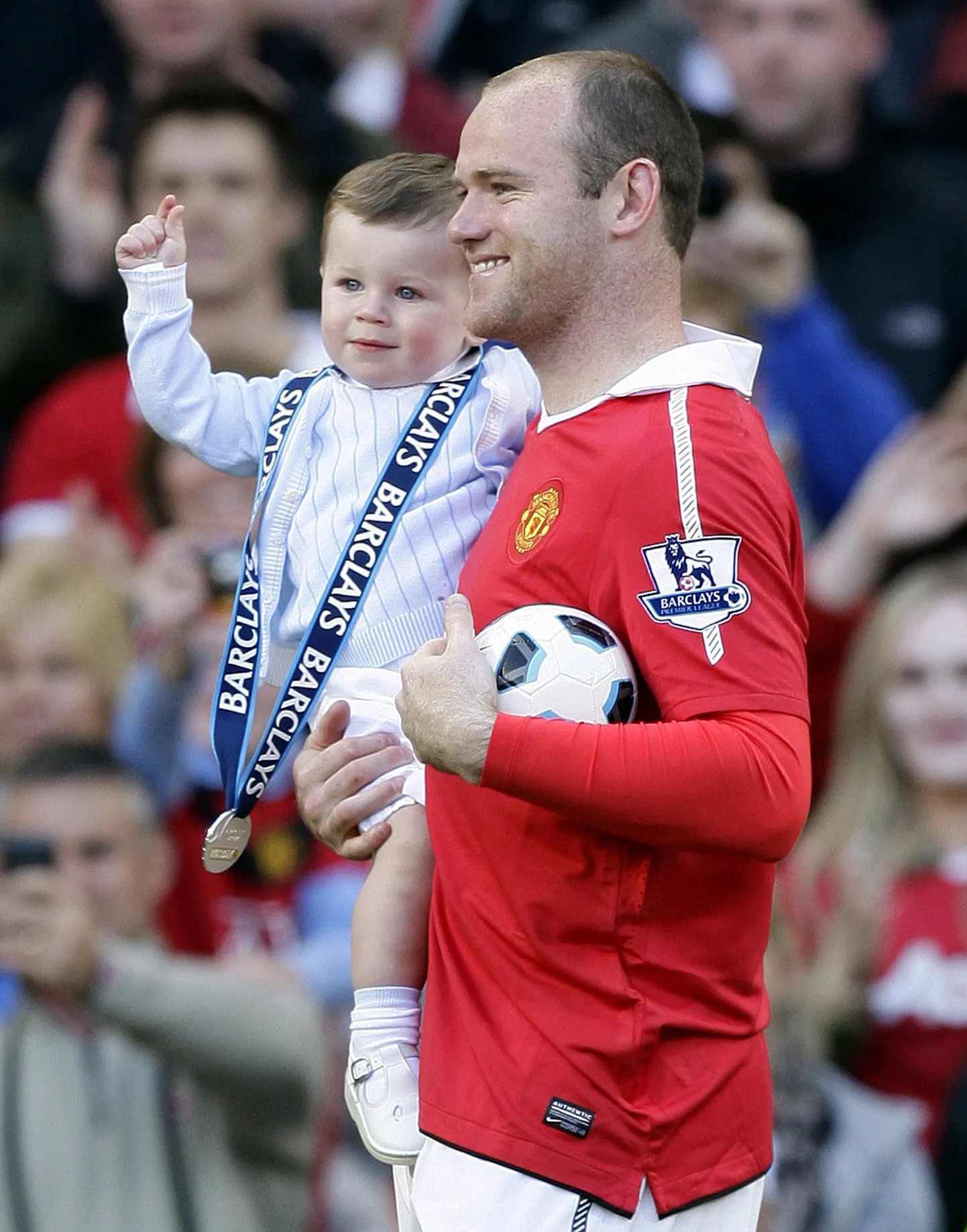 Wayne Rooney ja poeg Kai.