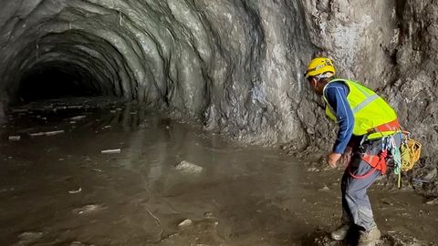 Nepal races against time as more than 900 people may be trapped in flood-hit tunnels