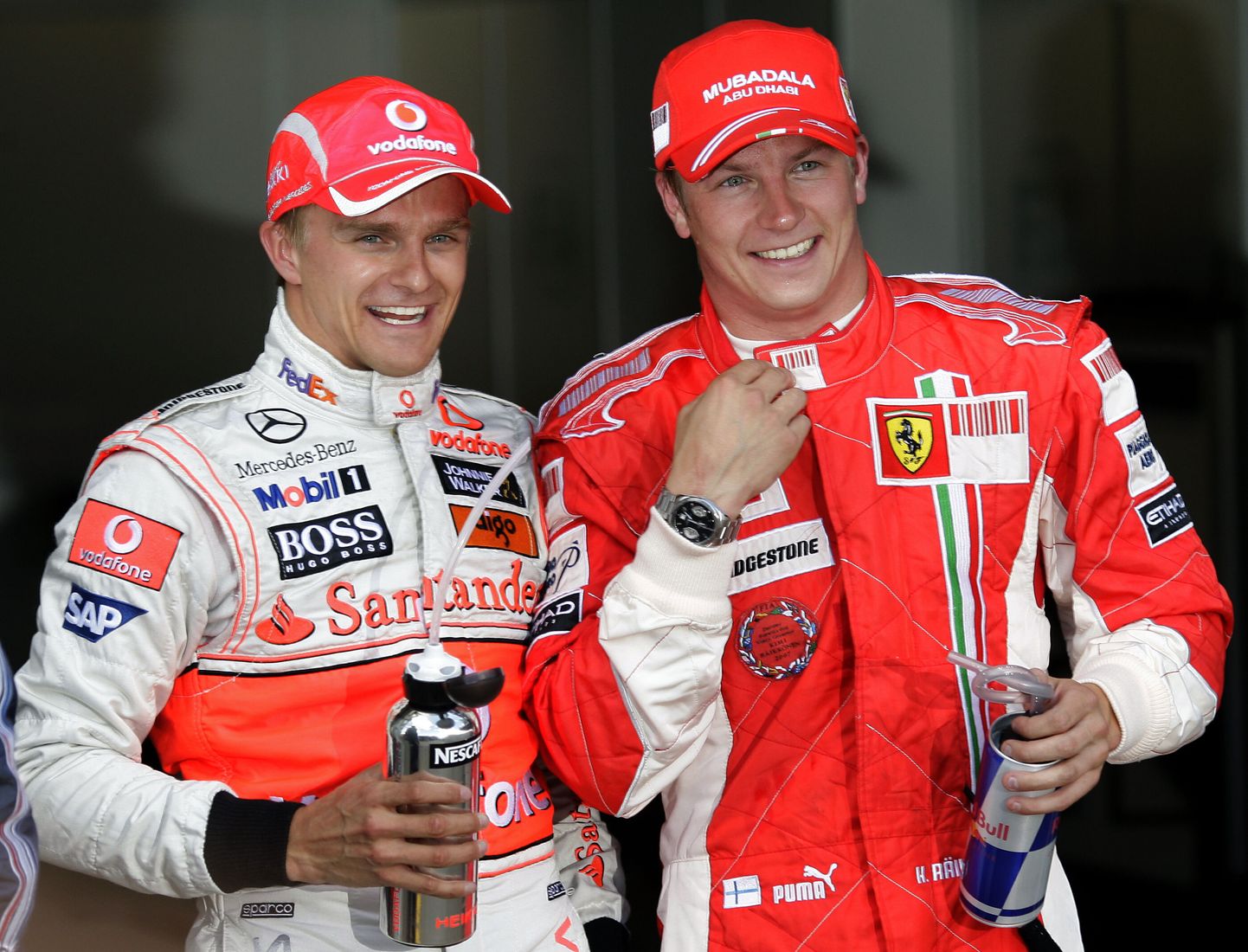 Heikki Kovalainen (vasakul) ja Kimi Räikkönen 2008. aastal.