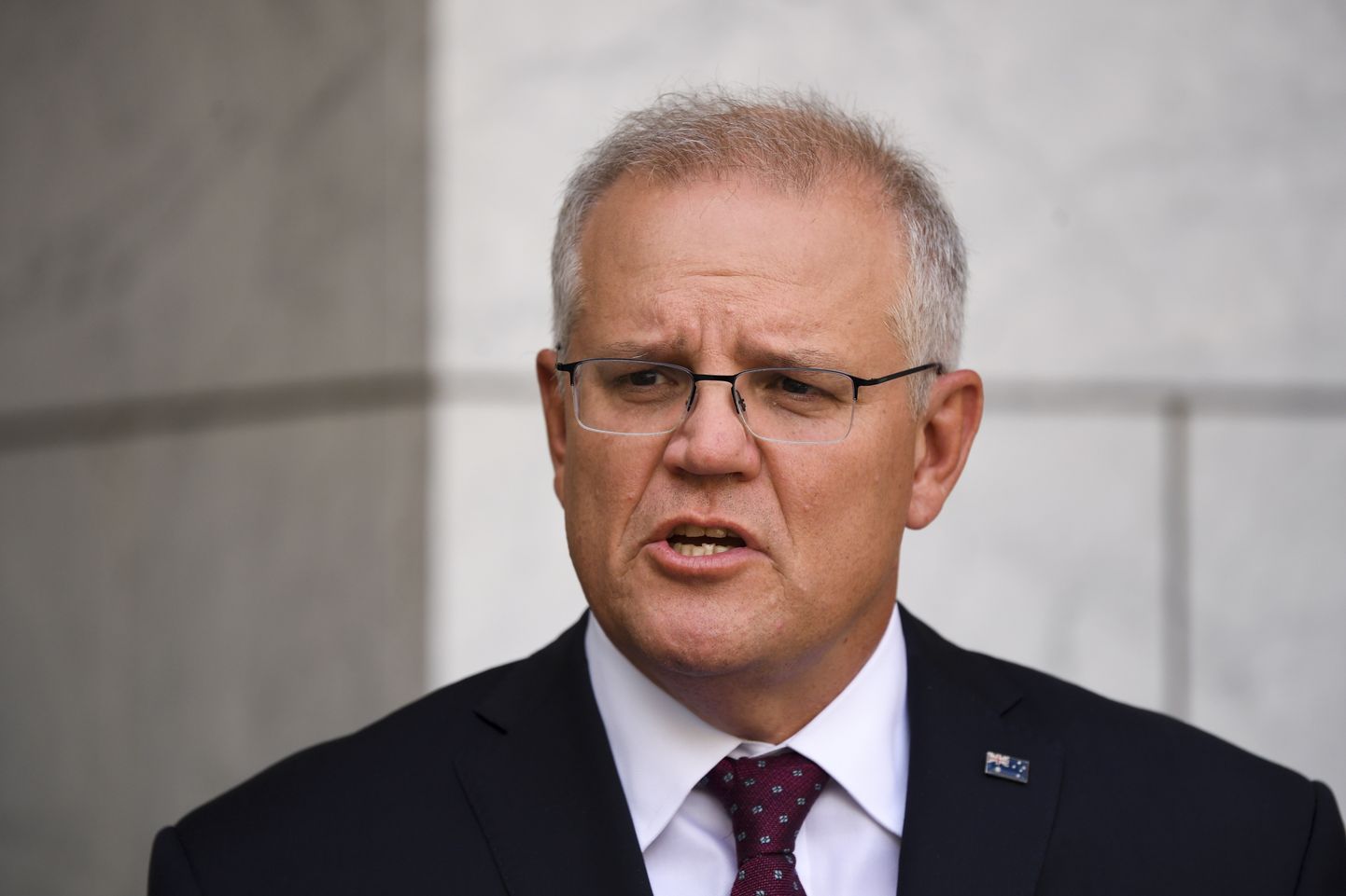 Austraalia peaminister Scott Morrison rääkimas 16. veebruaril 2021 Canberras parlamendihoones pressikonverentsil