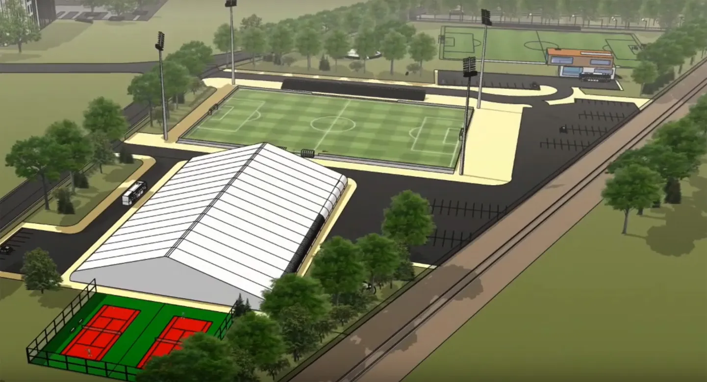 Футбольный холл планируется построить между железной дорогой и улицей Мальми. Рядом с ним вдобавок к существующему полю запланировано построить также полноразмерное поле с искусственным покрытием.