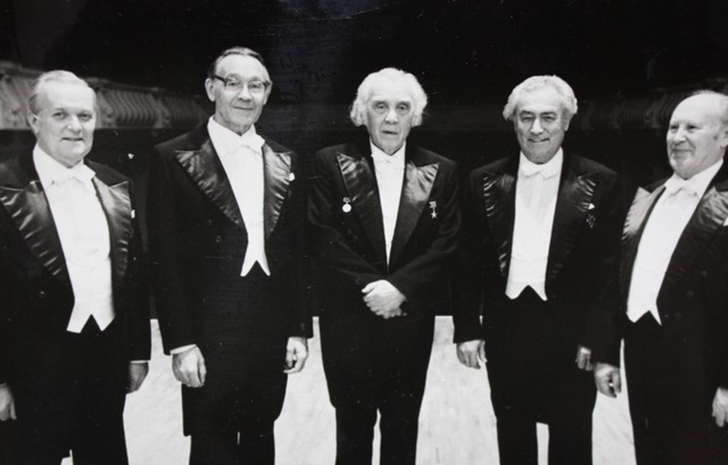 Pildil RAMi koorinõukogu 1984. aastal 2. novembril. Rudolf on vasakult teine ning paremal tema kõrval seisab koorijuht Gustav Ernesaks.