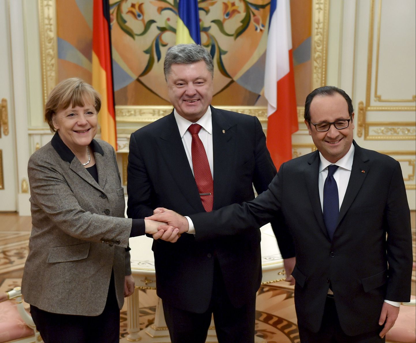 Ukraina president Petro Porošenko, Prantsuse president Francois Hollande ja Saksa kantsler Angela Merkel Kiievis.