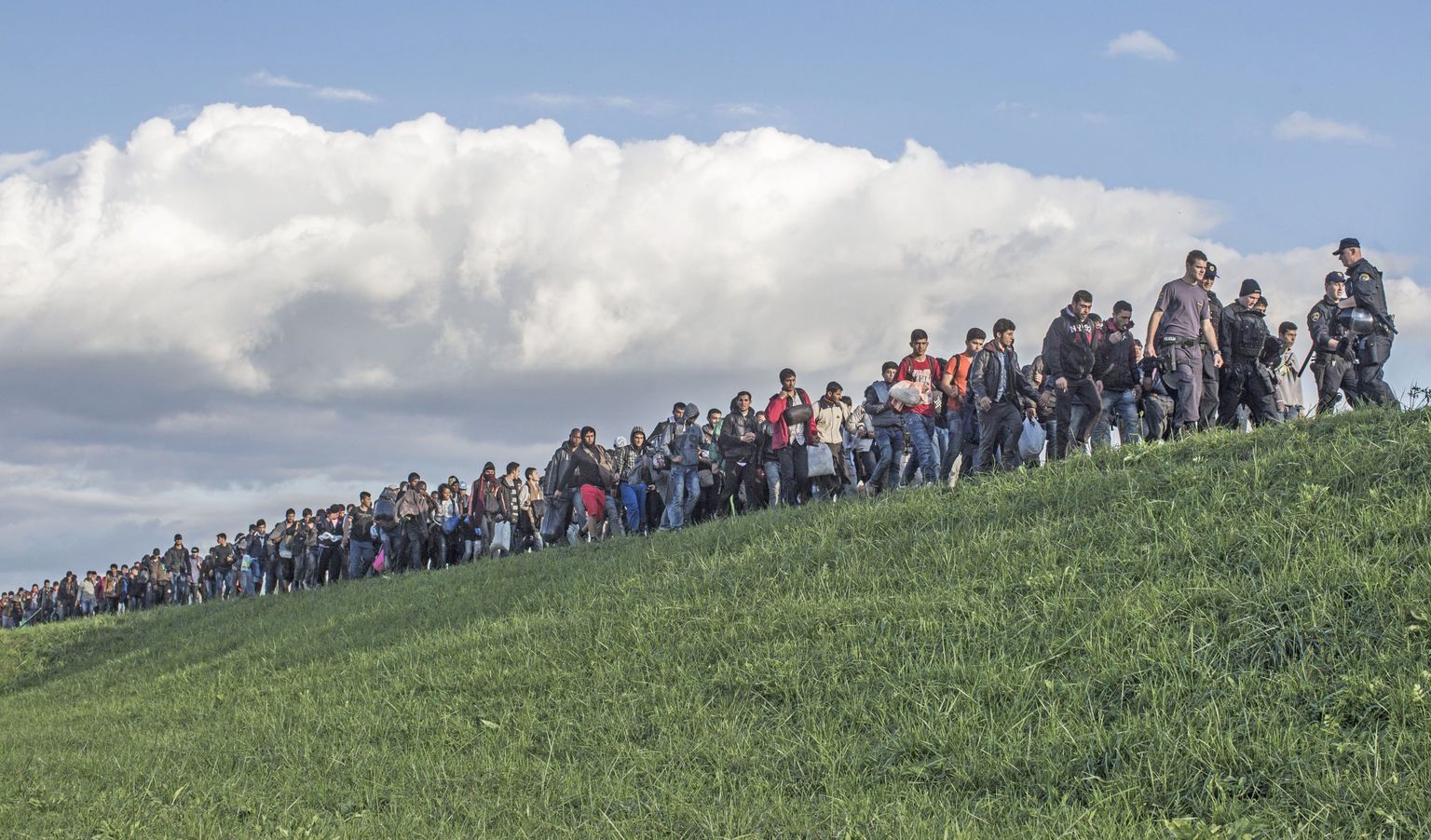 Oktoobris Sloveenia ja Horvaatia piiril. Põgenikud on leidnud uue tee.