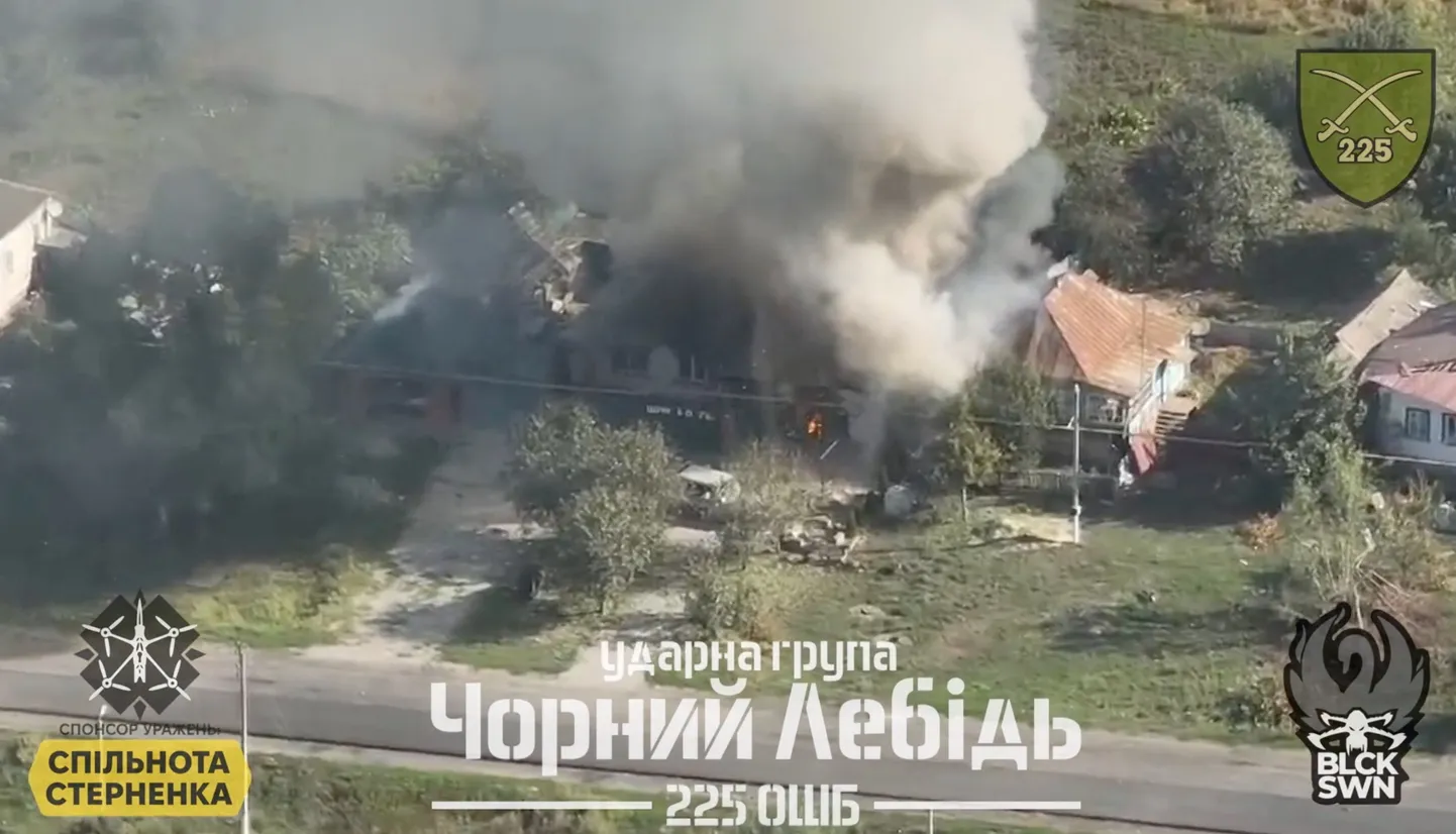 An aerial view shows smoke erupting from a Russian building on fire following a Ukrainian military operation in Korenevo, Kursk Region, Russia, in this screengrab taken from a handout video released on August 29, 2024. "Black Swan" unit of the 225 Seperate Assault Battalion/Handout via REUTERS