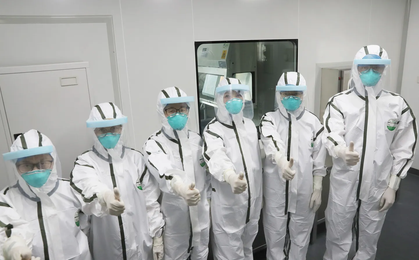 Hiina viirusekontrolli eksperdid.