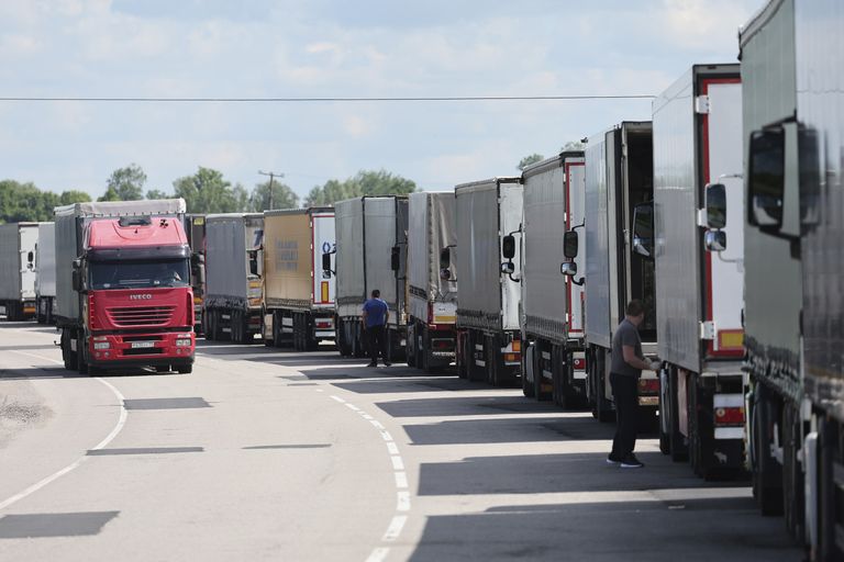 Trucks stands at the post-customs international checkpoint Chernyshevskoye at the Russian-Lithuanian border in Kaliningrad region, Russia, Wednesday, June 22, 2022. Russia’s security chief on Tuesday said Moscow will respond to Lithuania’s decision to bar rail transit of goods subject to European Union sanctions from Russia to Russia's Baltic exclave of Kaliningrad. (AP Photo)