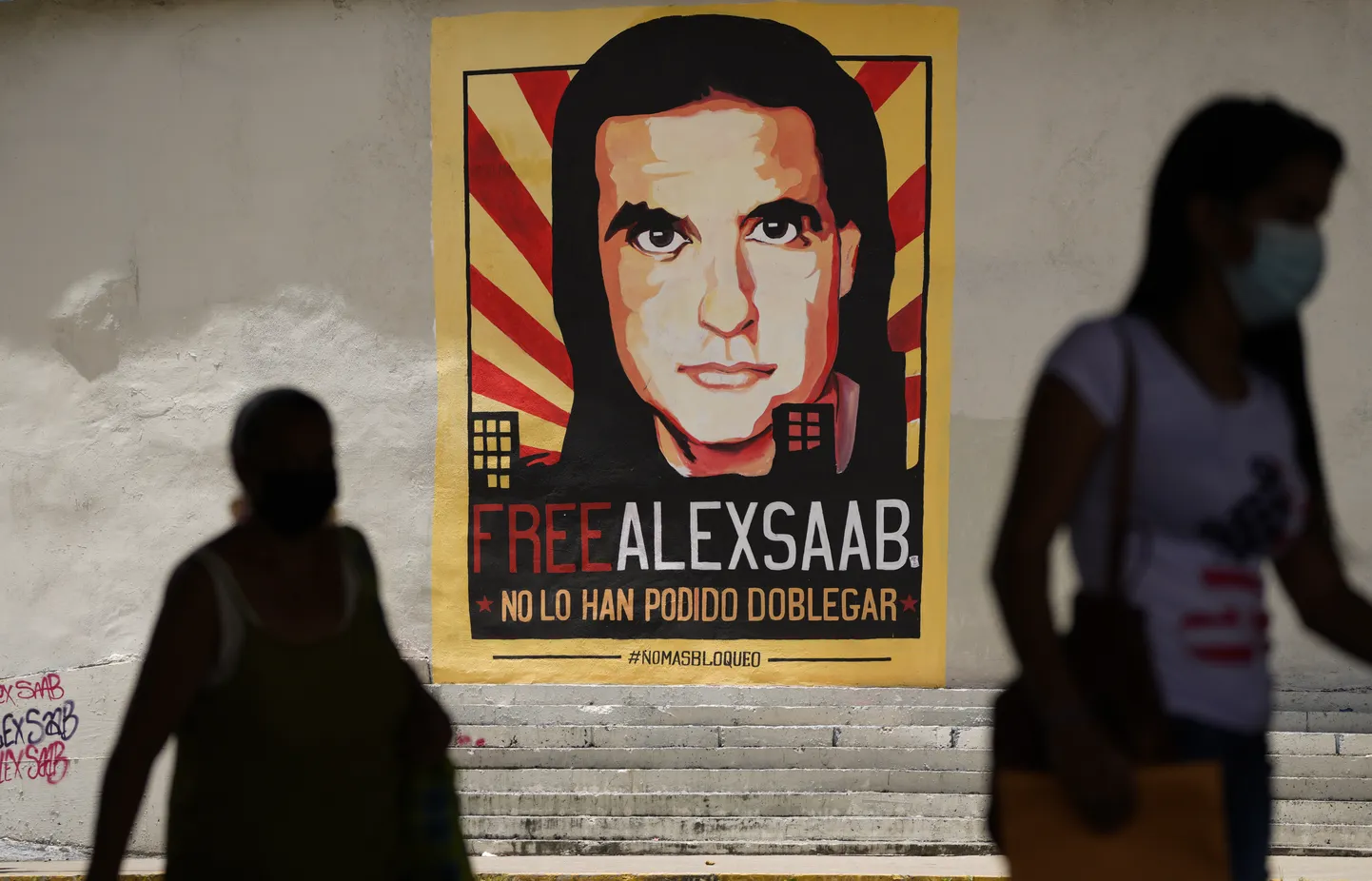 Alex Saabi vabastamisele kutsuv seinamaaling Caracases.