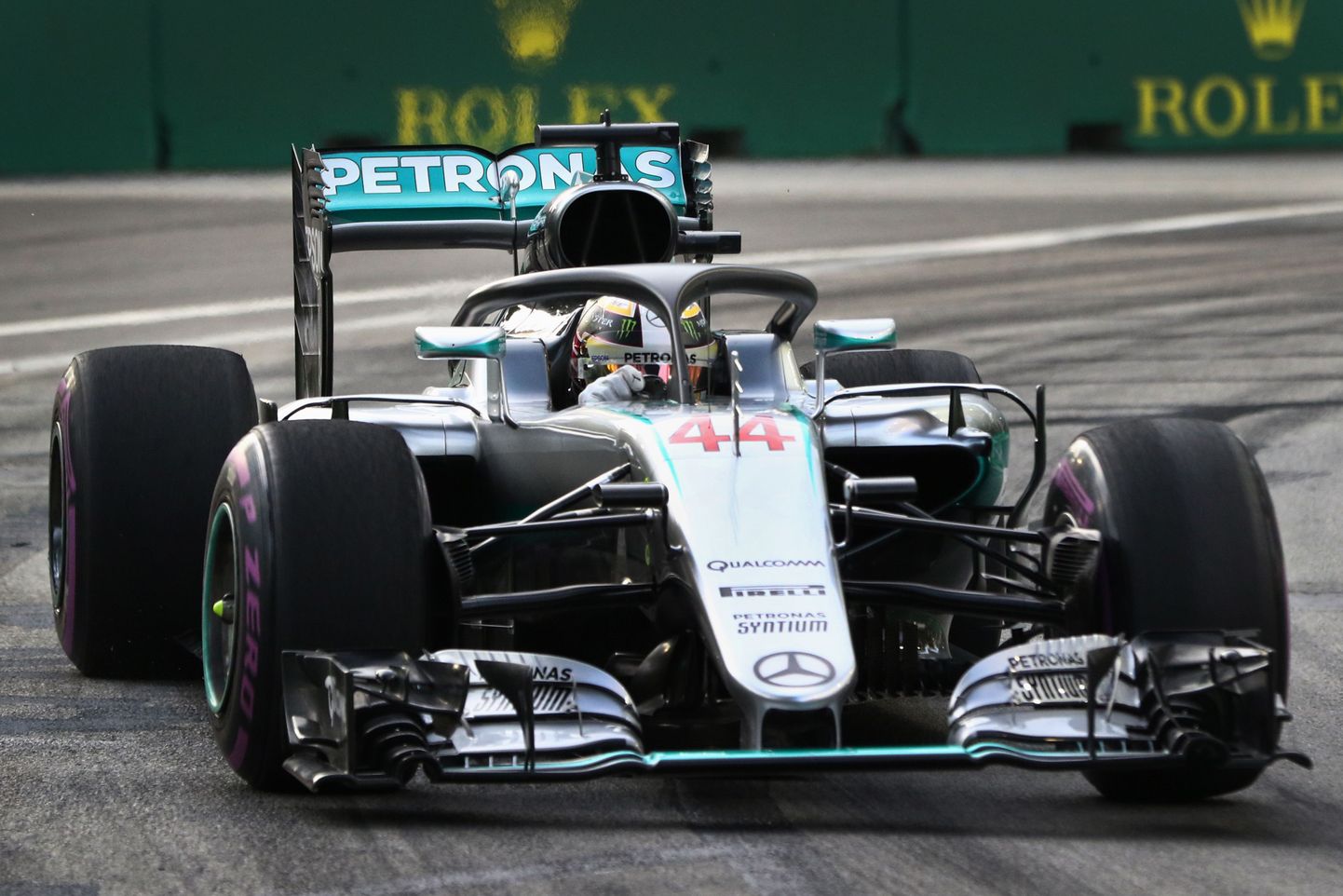 Mercedes driver Lewis Hamilton of Britain steers his car during the first practice session for the Singapore Formula One Grand Prix on the Marina Bay City Circuit Singapore, Friday, Sept. 16, 2016. (AP Photo/Yong Teck Lim)