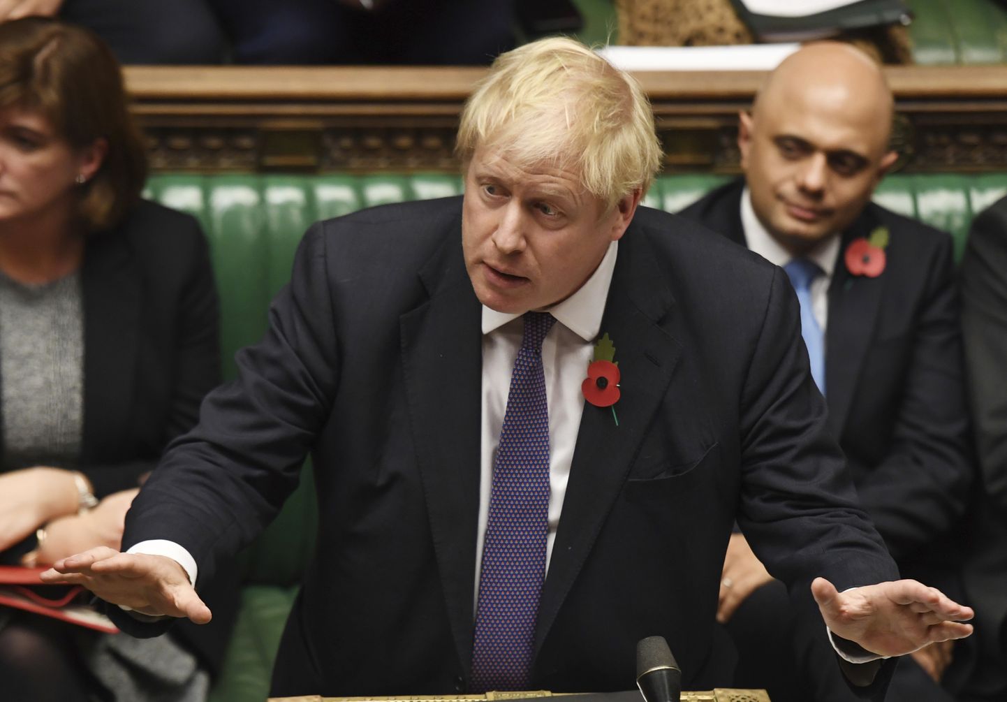 Britain's Prime Minister Boris Johnson speaks to lawmakers during the election debate in the House of Commons, London, Monday Oct. 28, 2019.   Lawmakers on Monday rejected Johnson's call for a December national election, in the hope of breaking the political deadlock over Brexit. (Jessica Taylor/House of Commons via AP)