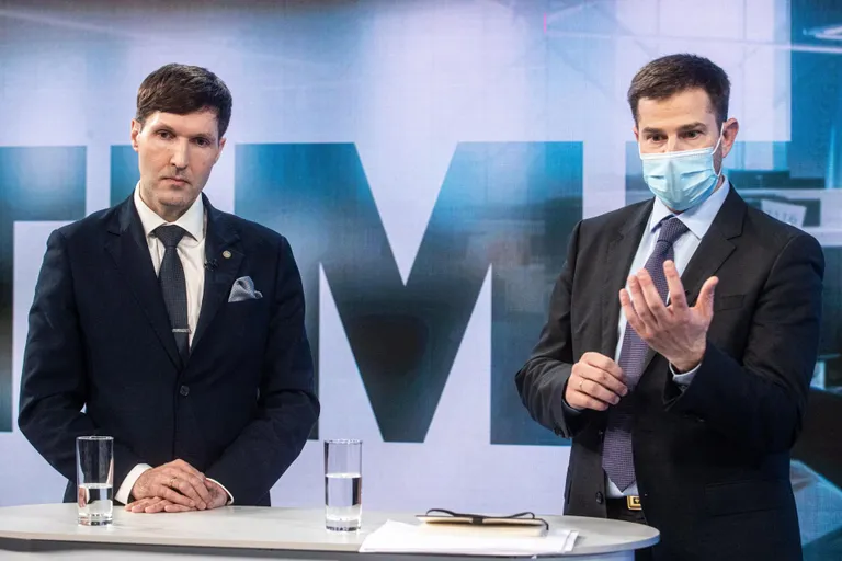 Председатель партии EKRE Мартин Хельме и министр внутренних дел Кристьян Яани.