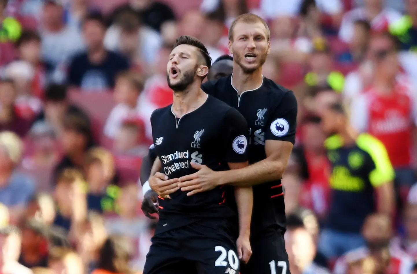 Adam Lallana ja Ragnar Klavan.