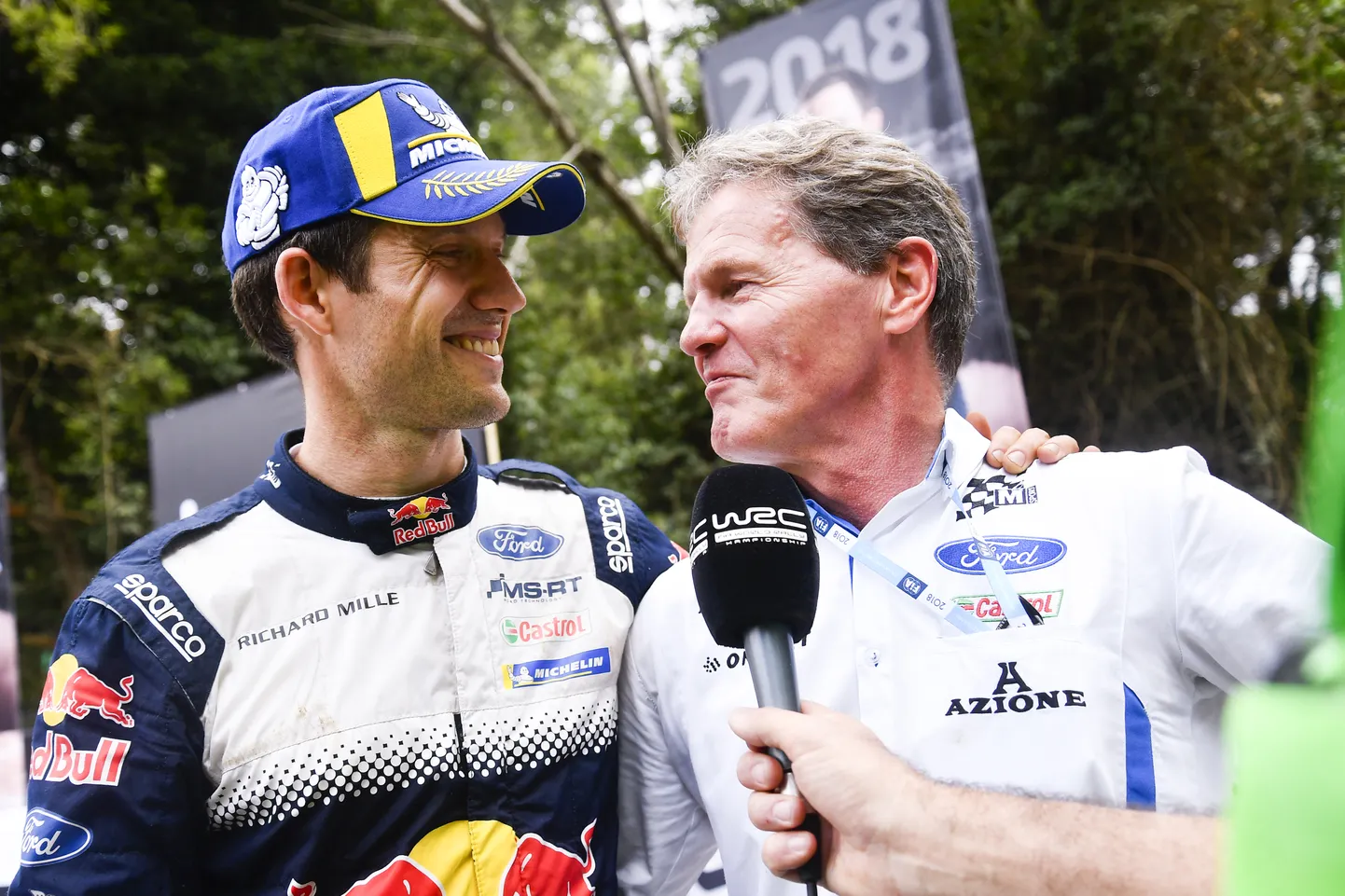Sébastien Ogier (vasakul) ja Malcolm Wilson 2018. aastal, mil prantslane sõitis M-Spordi meeskonnas.