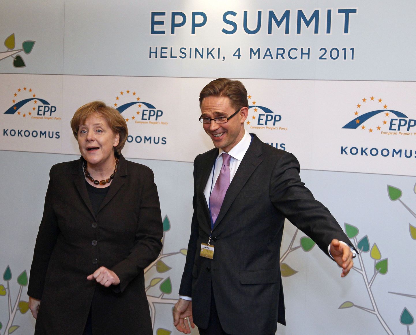 Saksa kantsler Angela Merkel ja Soome rahandusminister Jyrki Katainen Helsingis ELi konservatiivide kohtumise eel.