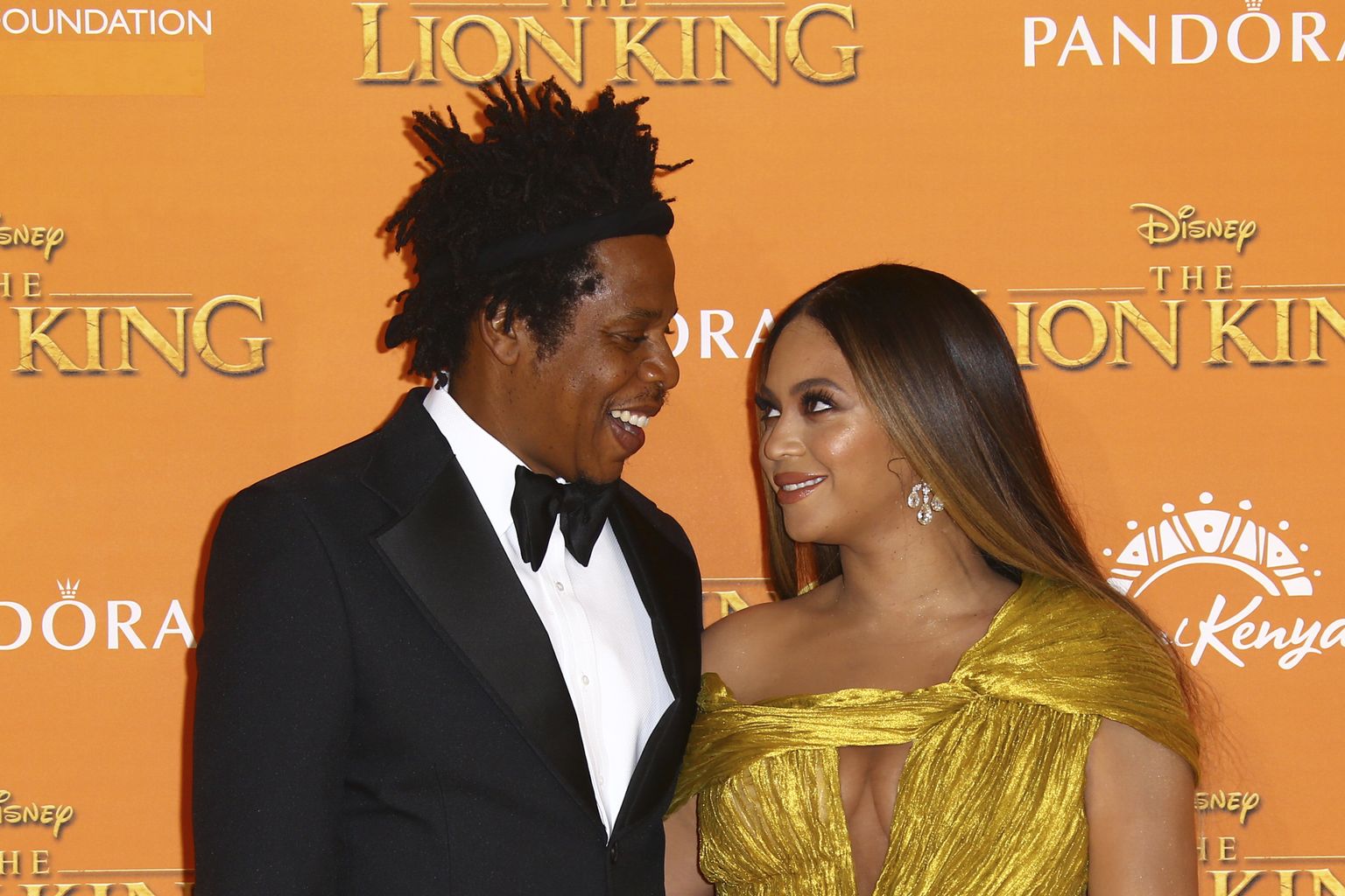 Jay-Z (vasakul) ja tema abikaasa Beyonce (paremal).