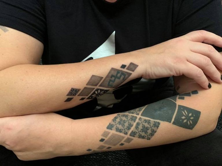Lindas Mūrnieces tetovējumi