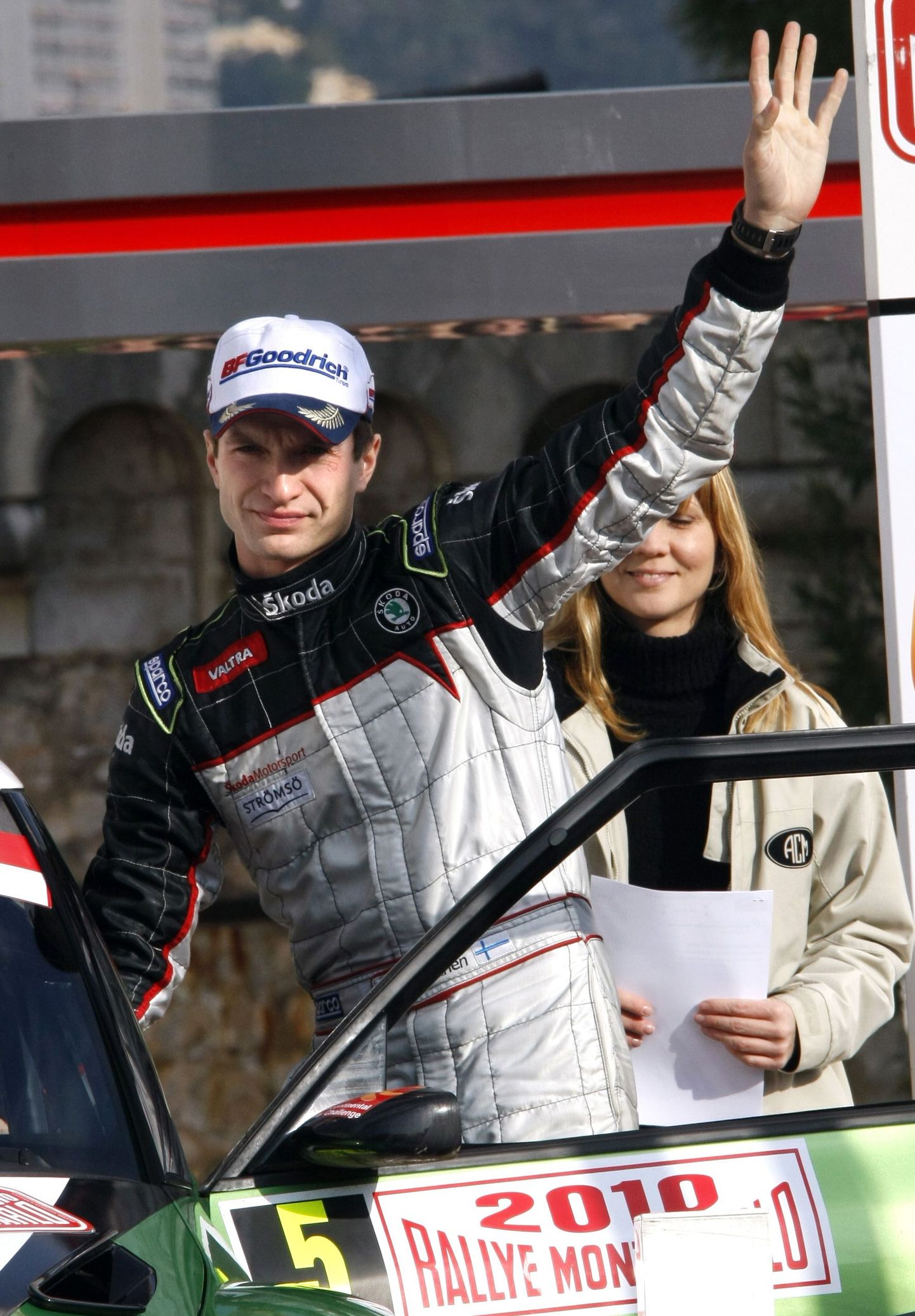 Juho Hanninen of Finland waves after taking second position in the 78th Monte Carlo Rally in Monaco January 23, 2010. Compatriot Mikko Hirvonen won the race.  REUTERS/Eric Gaillard (MONACO - Tags: SPORT MOTOR RACING)