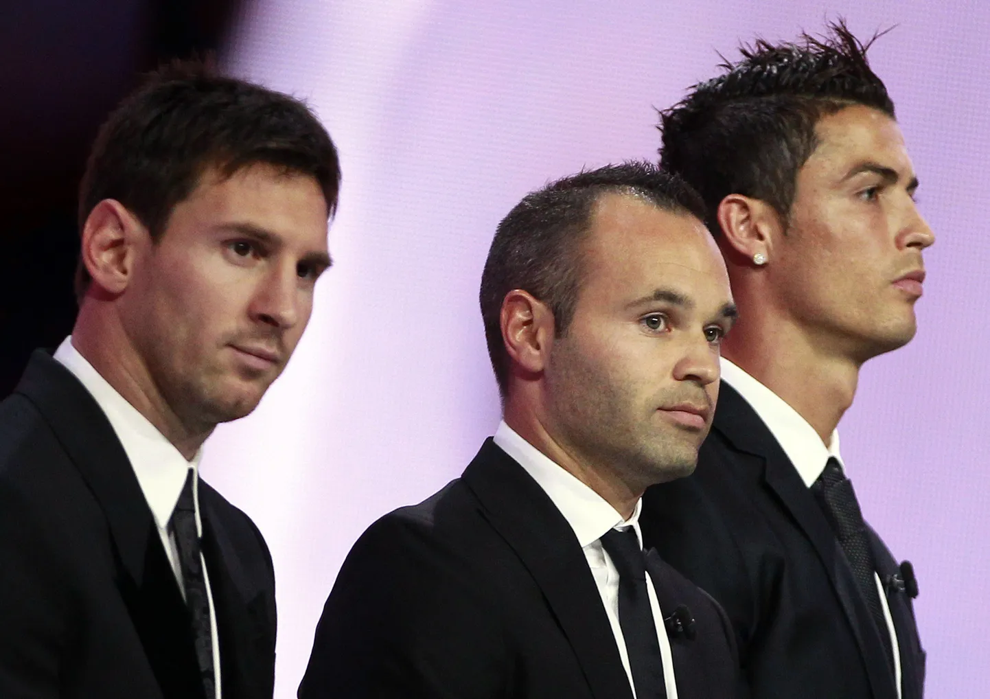 Lionel Messi (vasakult), Andres Iniesta ja Cristiano Ronaldo - üks neist kolmest on 2012. aasta parim jalgpallur.