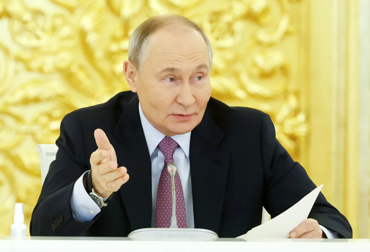 Путин