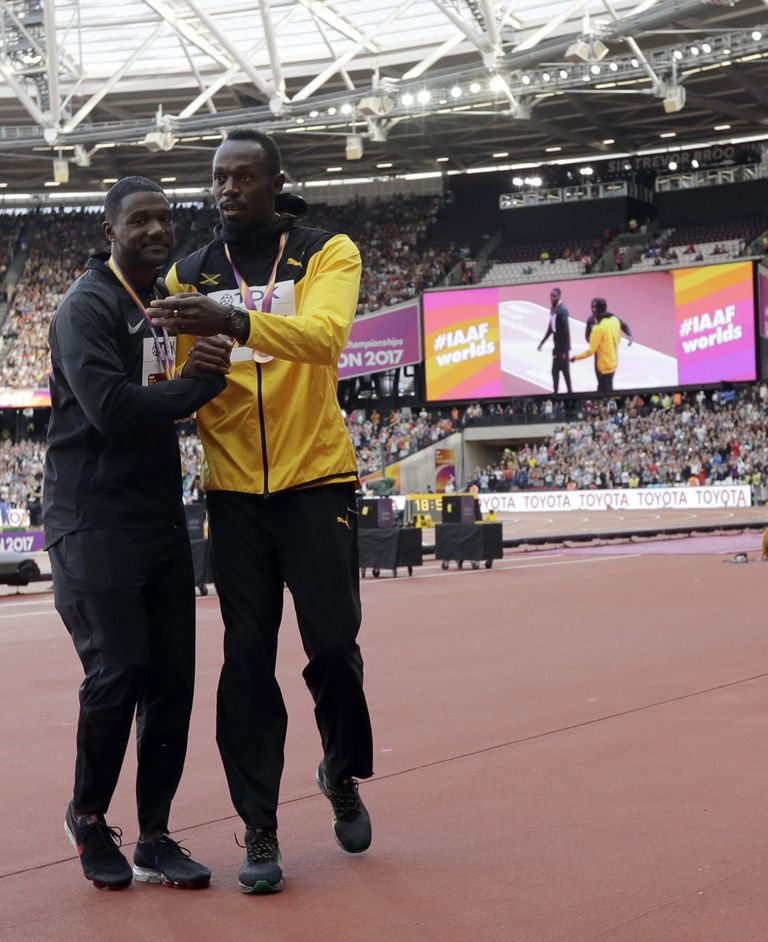 Justin Gatlin ja Usain Bolt (paremal)
