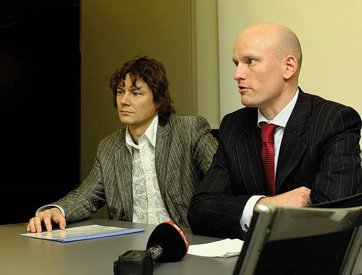 Rain Tamme (paremal) ja Tõnis Haaveli juhitavat Gildi süüdistatakse aktsiate kantimises.