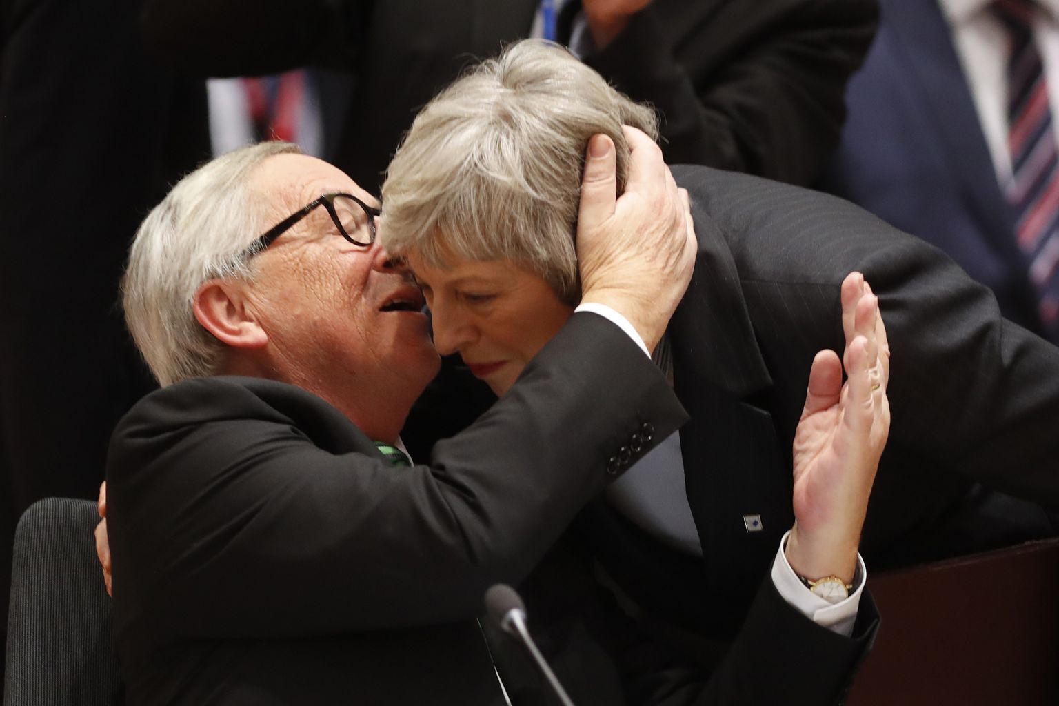 Jean-Claude Juncker ja Theresa May.