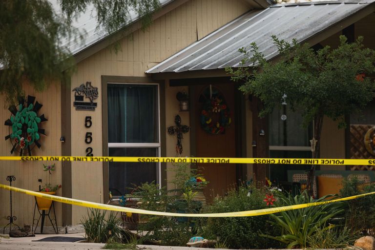 UVALDE, TX - MAY 24: The home of suspected gunman, 18-year-old Salvador Ramos, is cordoned off with police tape on May 24, 2022 in Uvalde, Texas. According to reports, Ramos killed 19 students and 2 adults in a mass shooting at Robb Elementary School before being fatally shot by law enforcement. Jordan Vonderhaar/Getty Images/AFP== FOR NEWSPAPERS, INTERNET, TELCOS & TELEVISION USE ONLY ==