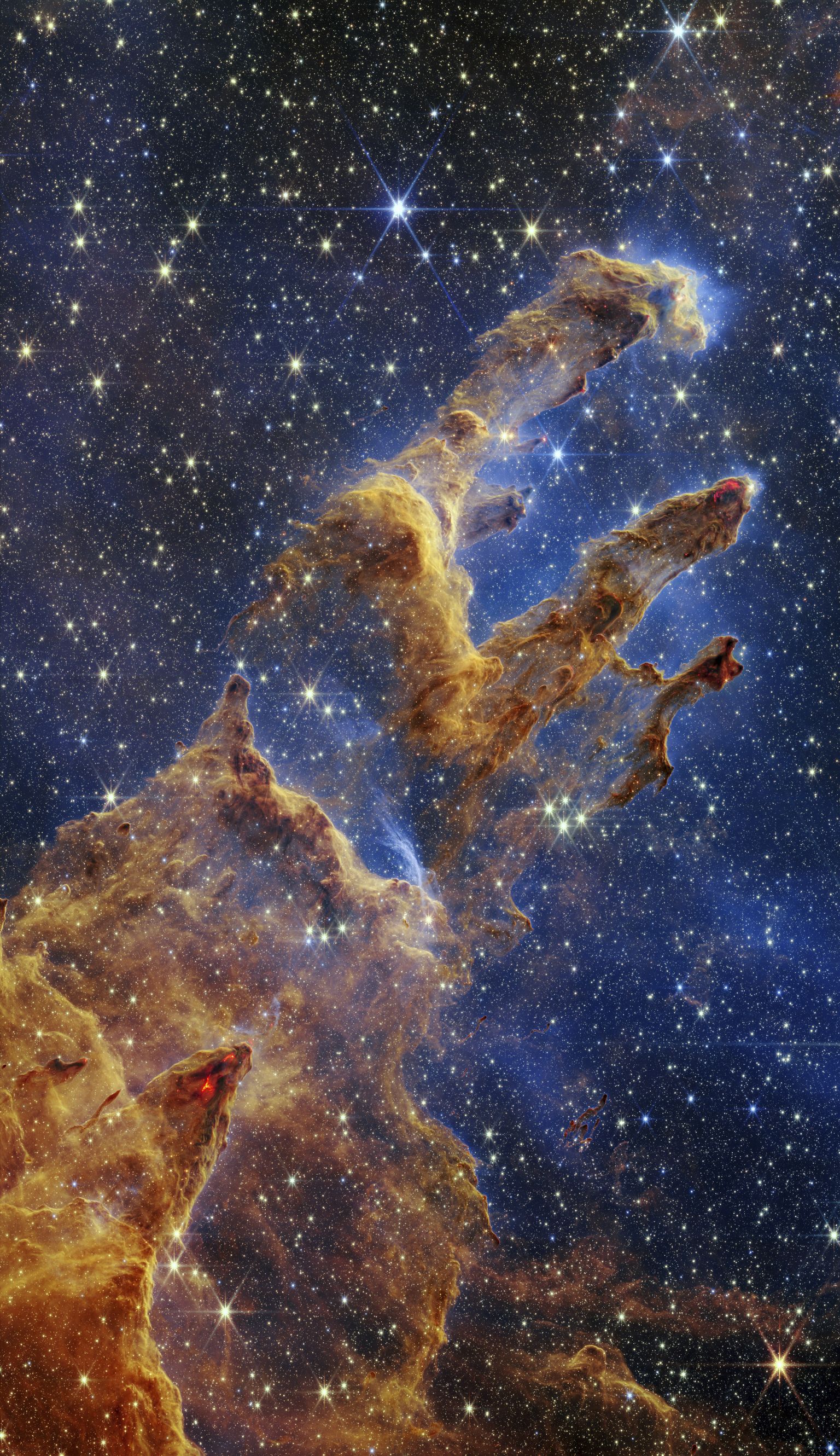 "Radīšanas pīlāri" Džeimsa Veba teleskopa attēlā.