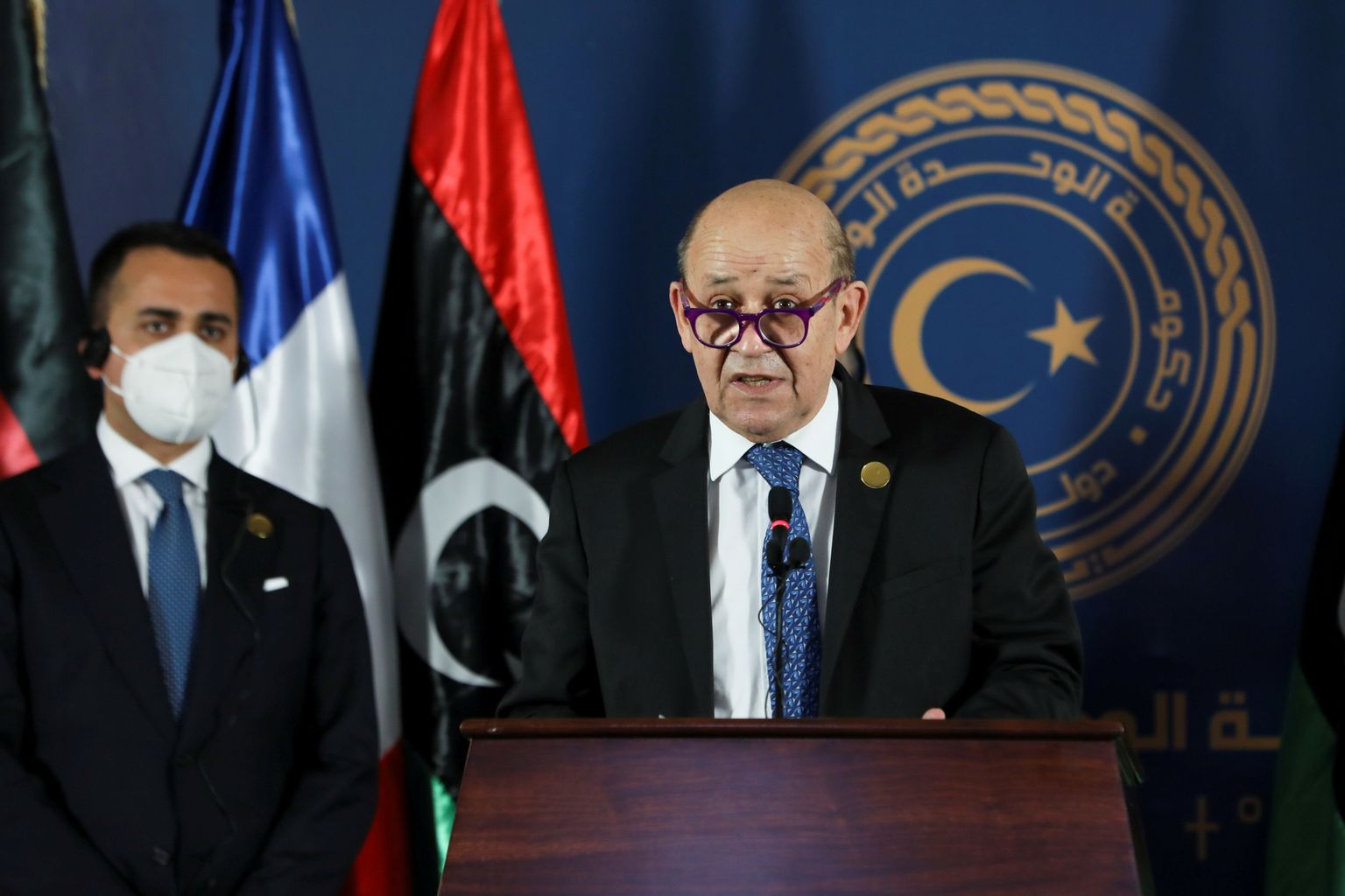 French Foreign Minister Jean-Yves Le Drian speaks as he delivers a joint statement with German Foreign Minister Heiko Maas, Italian Foreign Minister Luigi Di Maio, and Libyan Foreign Minister Najla el-Mangoush, in Tripoli, Libya March 25, 2021. REUTERS/Hazem Ahmed REFILE - CORRECTING ID