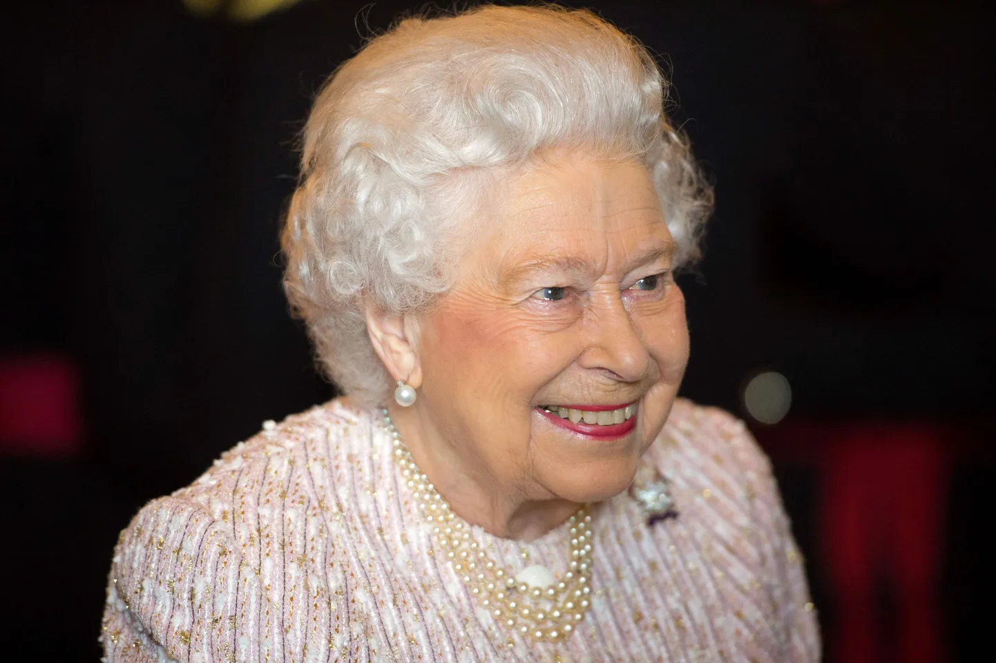 Britain's Queen Elizabeth II gestures as she meets members of The Royal Lancers during a reception following the ceremonial presentation of the Guidon to The Royal Lancers at Windsor Castle, in Berkshire on April 5, 2017.  / AFP PHOTO / POOL / Dominic Lipinski