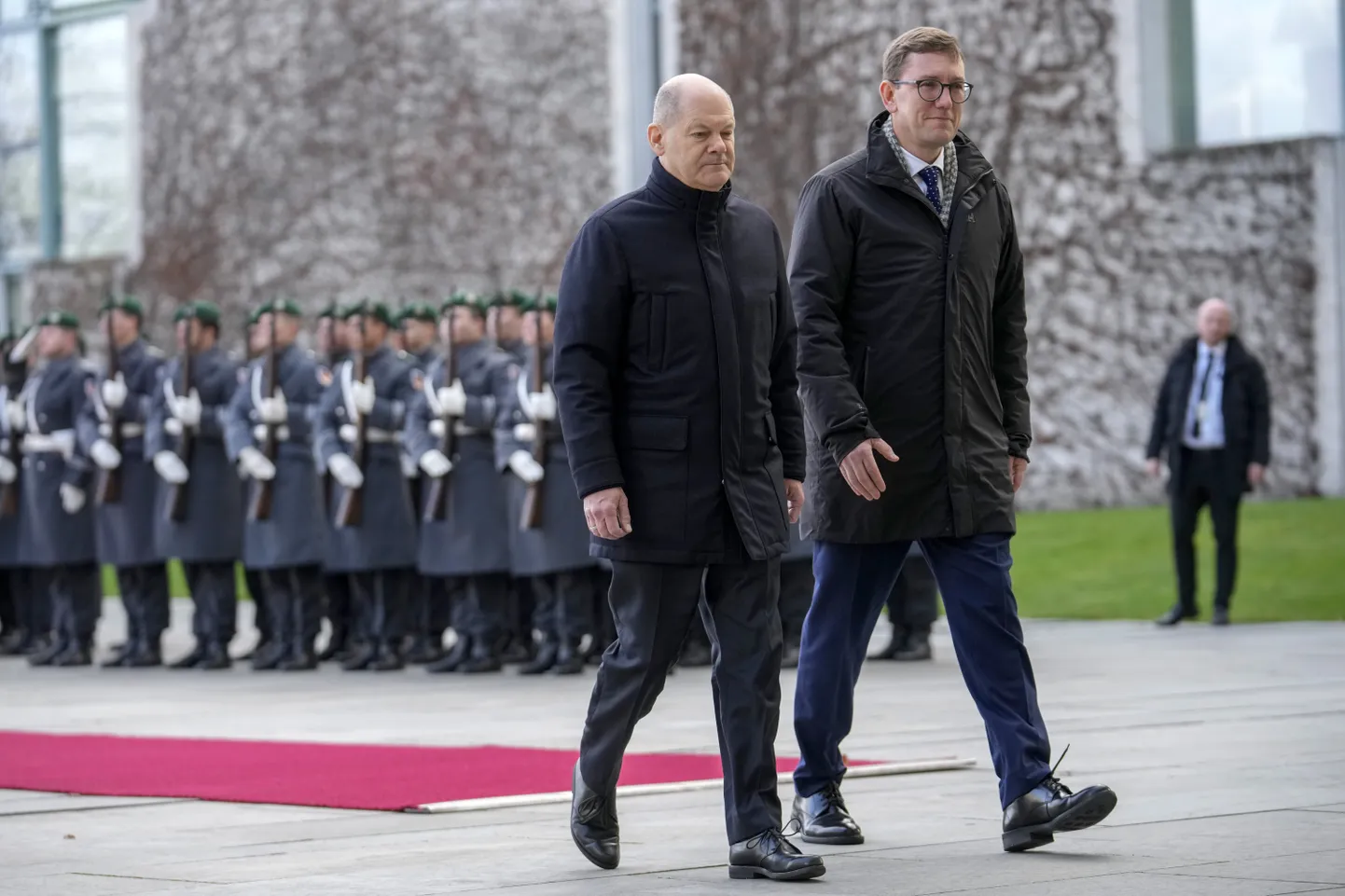 German Chancellor Olaf Scholz (left) welcomes Estonian Prime Minister Kristen Michal at the chancellery in Berlin, Friday, Dec. 20, 2024.