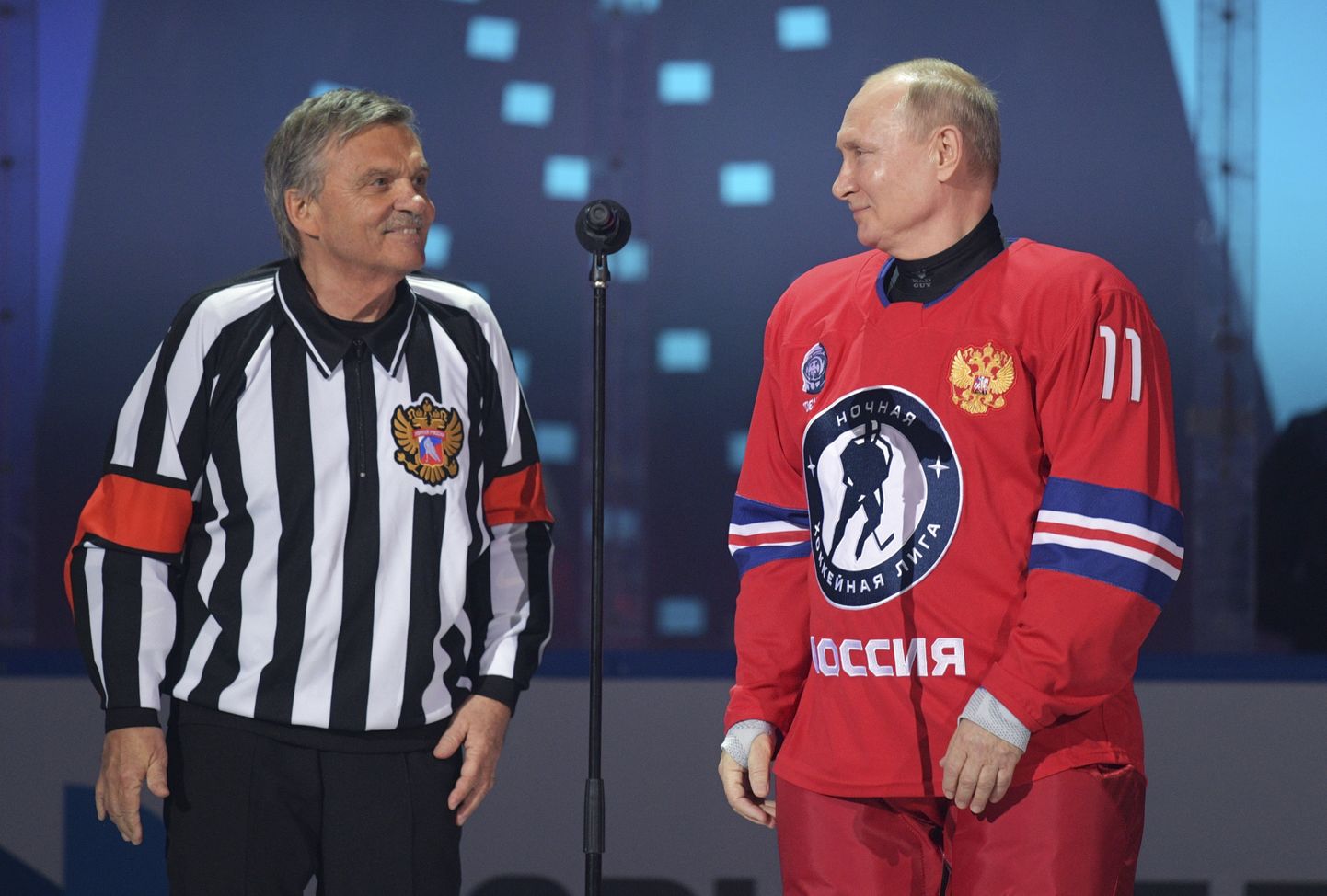 Renē Fāzels (pa kreisi) un Vladimirs Putins.