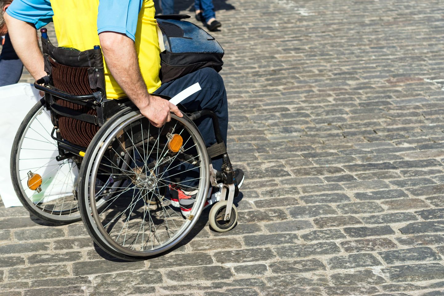 Человек с инвалидной коляске