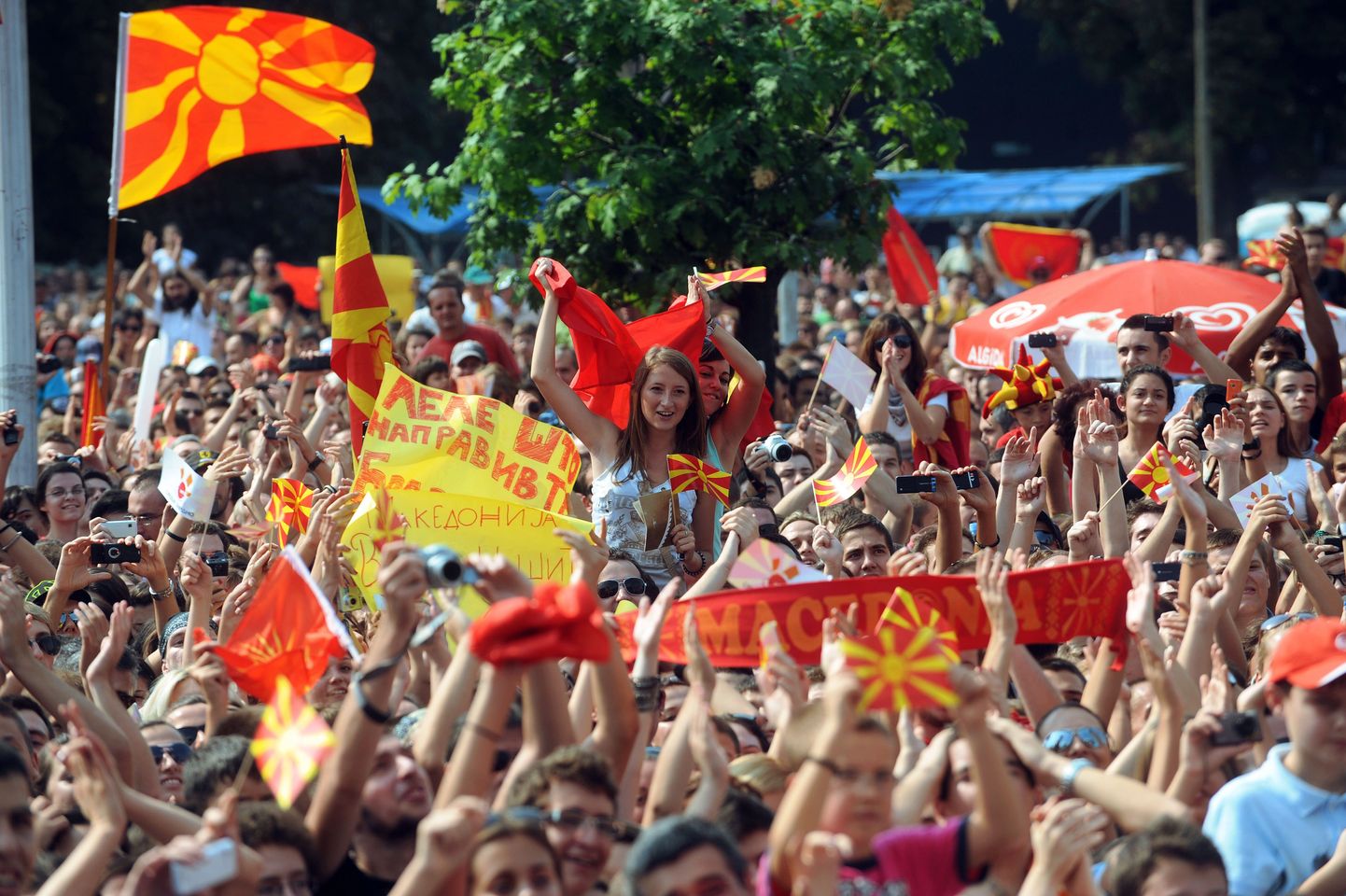 Tens of thousands of Macedonians celebrate the European success of the Macedonian national basketball team after their triumphant return home to Skopje, on September 19, 2011. The Macedonian basketball team won the high fourth place in the European Basketball Championship in Lithuania, causing sensation across the continent. Tens of thousands of Macedonians today celebrated the European success on the Skopje central square with the members of the national basketball team. AFP PHOTO/ROBERT ATANASOVSKI