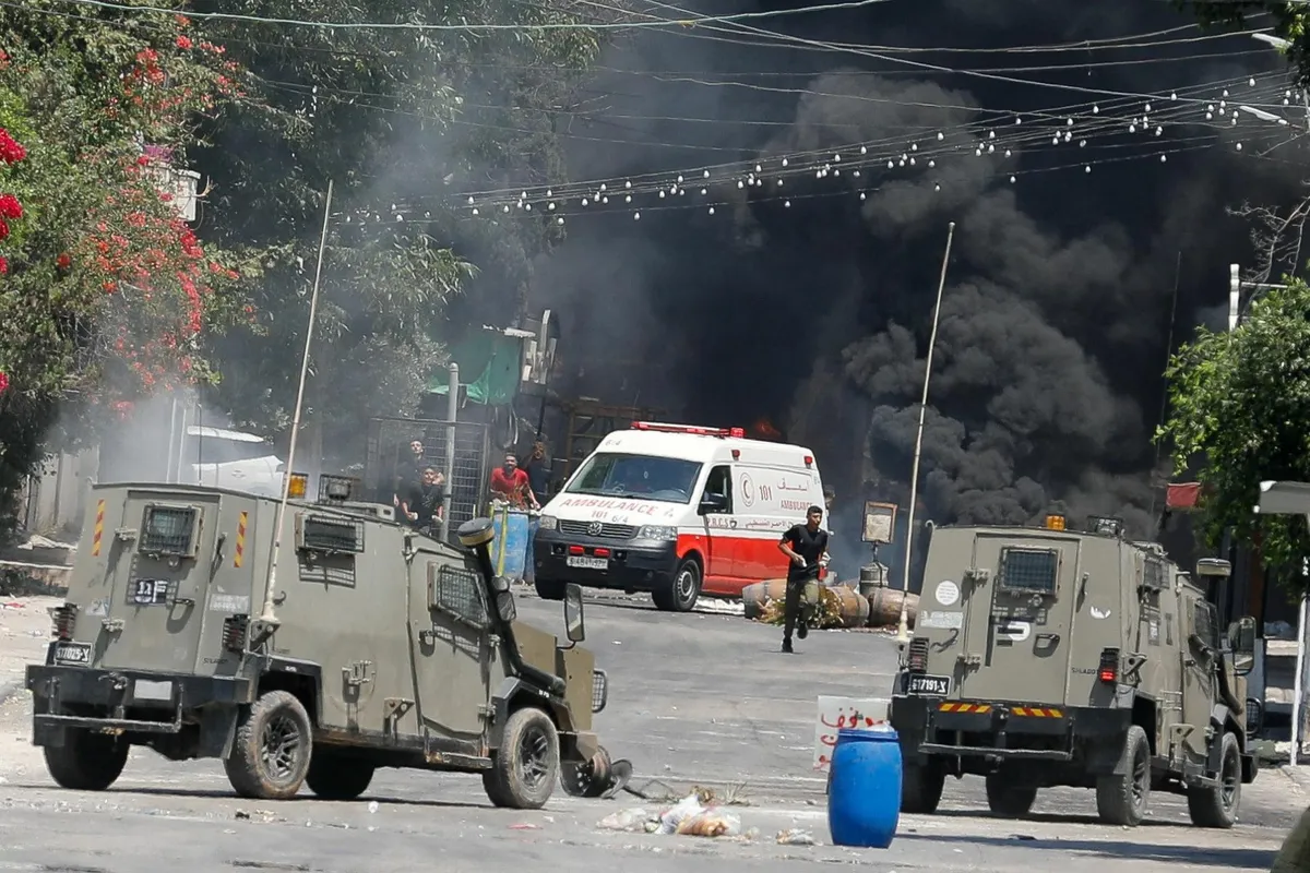 Israeli forces conducting a raid in Jenin, in the occupied West Bank.