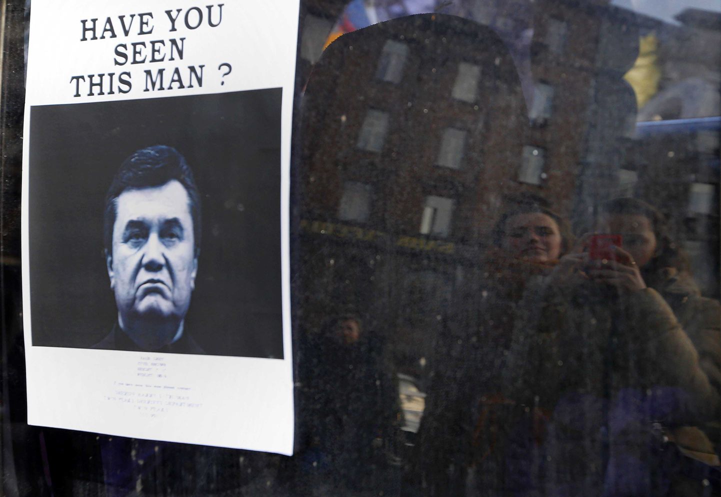 24. veebruaril Maidanile pandud plakat, milles kutsuti üles Viktor Janukovõtšit veresauna eest vastutusele võtma.