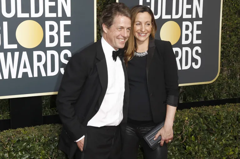 Hugh Grant ja  Anna Eberstein